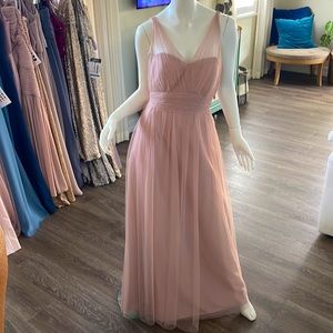 Sheer love in  lace, blush, open back, floor length gown in size 10.